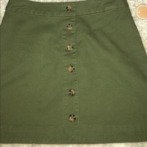 Olive green skirt.